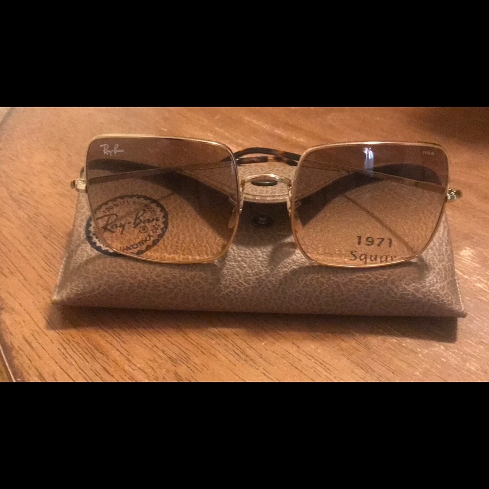 Brand new Ray Bans never worn. Gold.